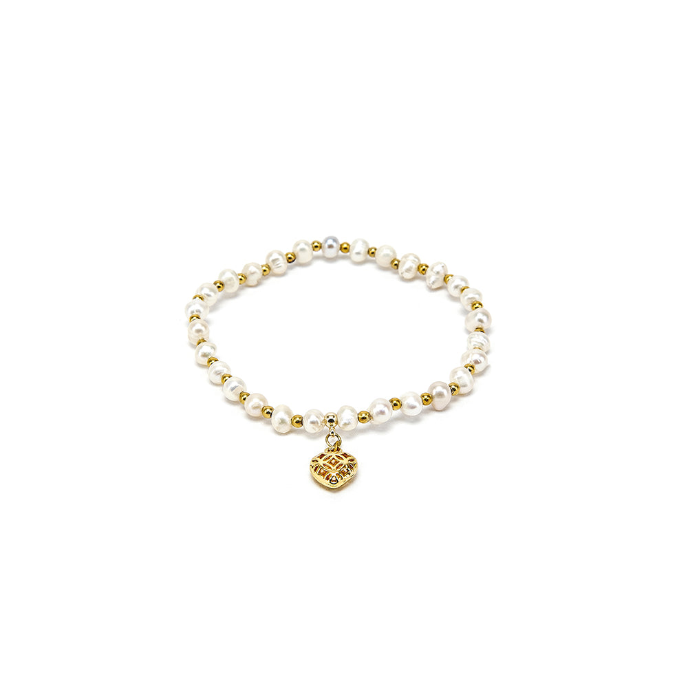 BRACCIALE ELASTICO CUORE TRAFORATO E PERLE GOLD